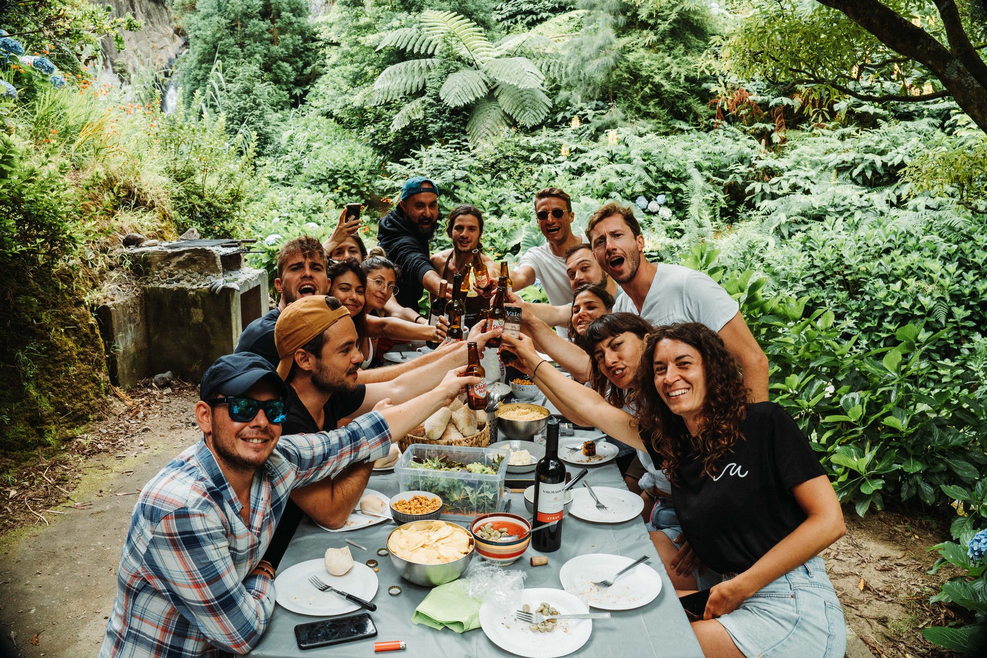 SurfWeek group sharing dinner outdoors